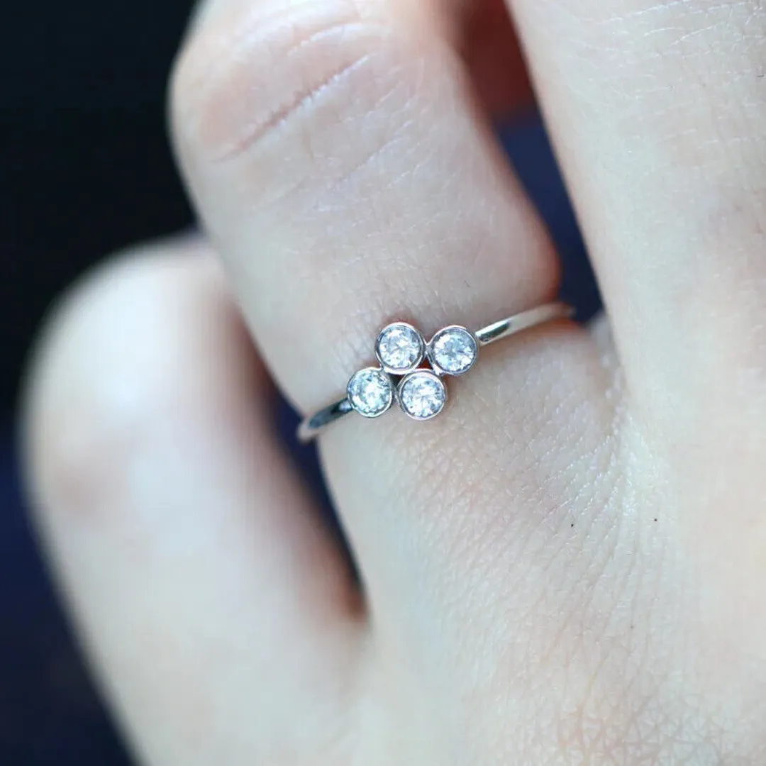 /public/photos/live/Round Moissanite 4 Stone Dainty Wedding Ring 659 (1).webp